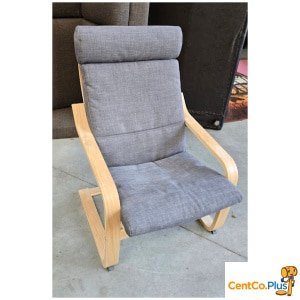 Fauteuil met grijs kussen