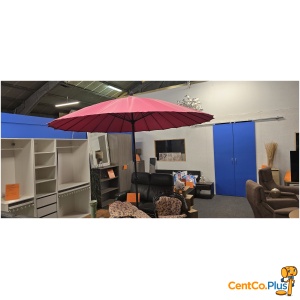 Roze parasol met draaisysteem